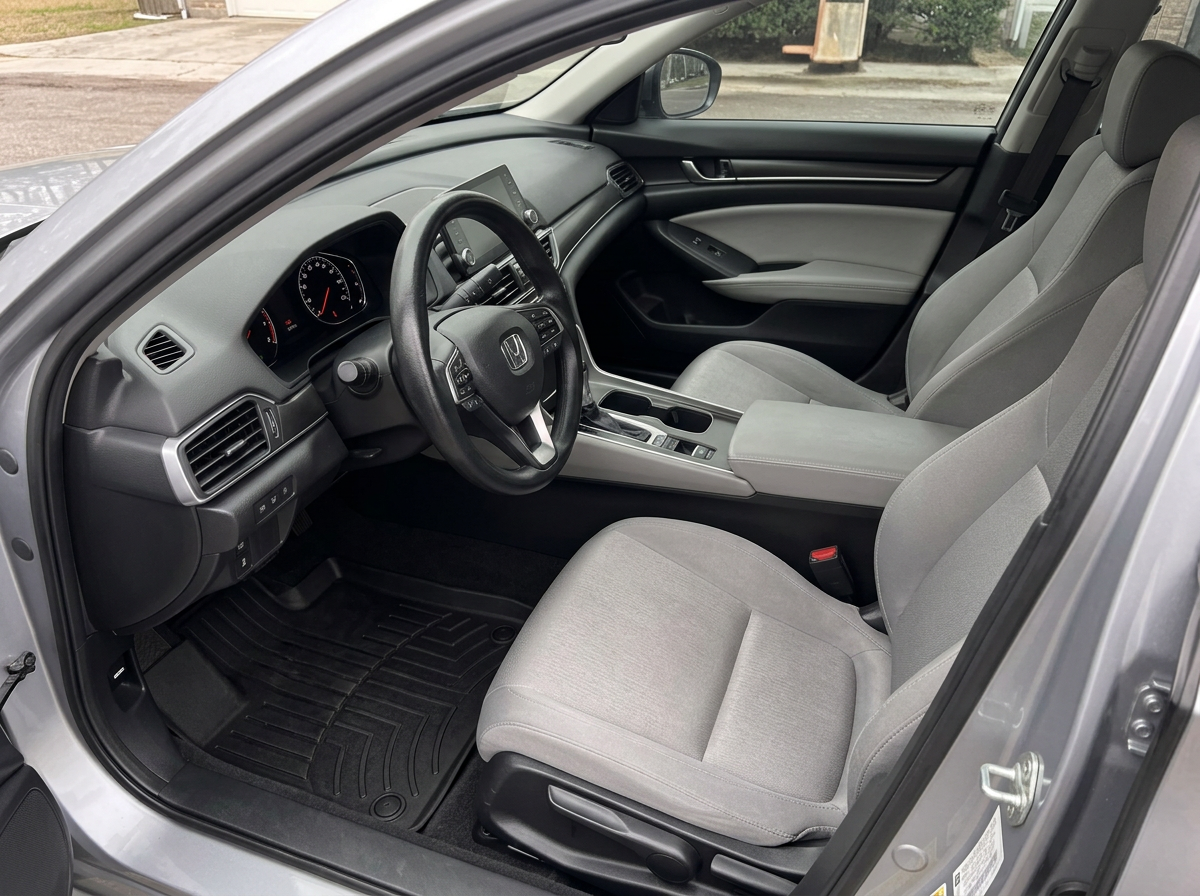 The same sedan interior spotless after detailing